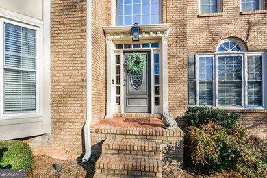 Imagine pulling into the driveway of a stunning traditional on Canongate At Eagle Watch Golf Club in Georgia - for sale on GolfHomes.com, golf home, golf lot