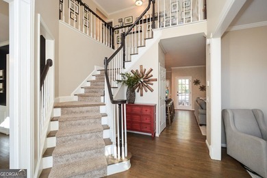 Imagine pulling into the driveway of a stunning traditional on Canongate At Eagle Watch Golf Club in Georgia - for sale on GolfHomes.com, golf home, golf lot