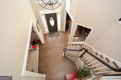 Imagine pulling into the driveway of a stunning traditional on Canongate At Eagle Watch Golf Club in Georgia - for sale on GolfHomes.com, golf home, golf lot