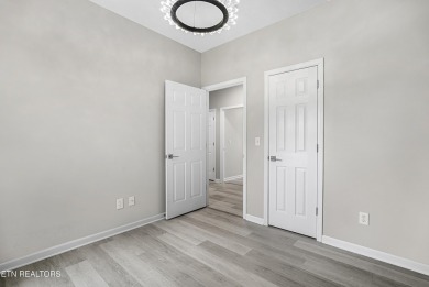 Don't miss this move-in ready 3-bedroom, 2-bath gem in the heart on Toqua Golf Course - Loudon County in Tennessee - for sale on GolfHomes.com, golf home, golf lot