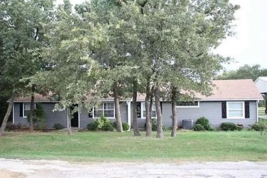Lake house getaway or retirement home of your dreams! 4 bed, 2.5 on Nocona Hills Golf Course in Texas - for sale on GolfHomes.com, golf home, golf lot