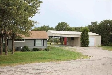 Lake house getaway or retirement home of your dreams! 4 bed, 2.5 on Nocona Hills Golf Course in Texas - for sale on GolfHomes.com, golf home, golf lot