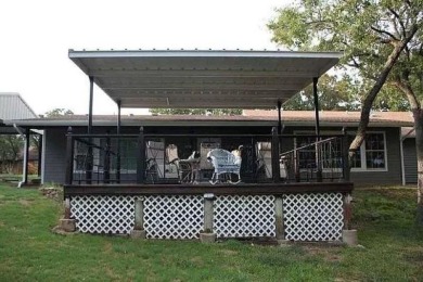 Lake house getaway or retirement home of your dreams! 4 bed, 2.5 on Nocona Hills Golf Course in Texas - for sale on GolfHomes.com, golf home, golf lot