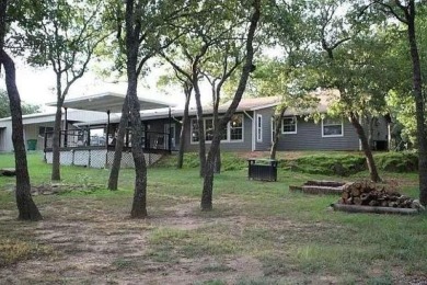 Lake house getaway or retirement home of your dreams! 4 bed, 2.5 on Nocona Hills Golf Course in Texas - for sale on GolfHomes.com, golf home, golf lot