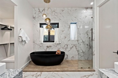 Welcome to this exceptional 7-bedroom luxury retreat, fully on Copper Rock Golf Course in Utah - for sale on GolfHomes.com, golf home, golf lot