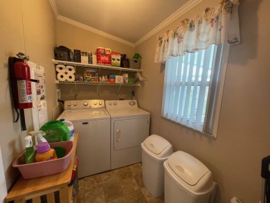 Listed by the Official Sales Team of Cypress Lakes Village on Big Cypress Golf and Country Club in Florida - for sale on GolfHomes.com, golf home, golf lot