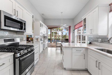 Gorgeous golf course views with private pool in highly on Ibis Golf and Country Club in Florida - for sale on GolfHomes.com, golf home, golf lot