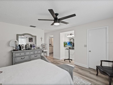 Beautifully remodeled 2-bedroom, 2-bathroom end-unit condominium on Seven Springs Golf and Country Club in Florida - for sale on GolfHomes.com, golf home, golf lot