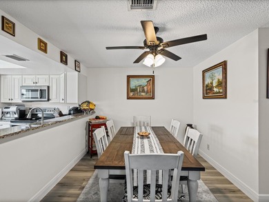 Beautifully remodeled 2-bedroom, 2-bathroom end-unit condominium on Seven Springs Golf and Country Club in Florida - for sale on GolfHomes.com, golf home, golf lot