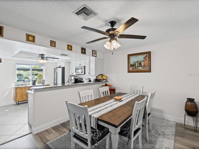 Beautifully remodeled 2-bedroom, 2-bathroom end-unit condominium on Seven Springs Golf and Country Club in Florida - for sale on GolfHomes.com, golf home, golf lot