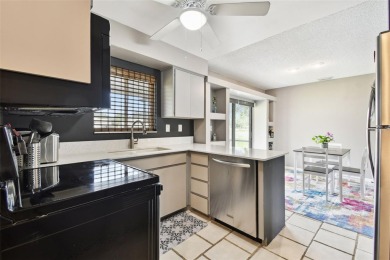 Excellent Buying opportunity! Move-in ready two bedroom, one and on East Bay Golf Club in Florida - for sale on GolfHomes.com, golf home, golf lot