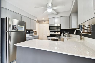 Excellent Buying opportunity! Move-in ready two bedroom, one and on East Bay Golf Club in Florida - for sale on GolfHomes.com, golf home, golf lot