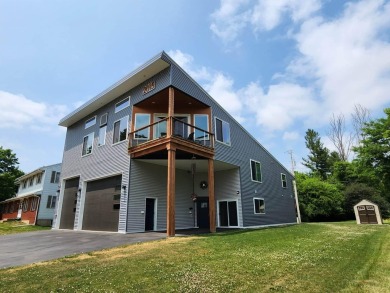 Take in the amazing views from this unique home located a block on Monroe Country Club in Wisconsin - for sale on GolfHomes.com, golf home, golf lot