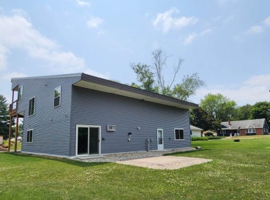 Take in the amazing views from this unique home located a block on Monroe Country Club in Wisconsin - for sale on GolfHomes.com, golf home, golf lot