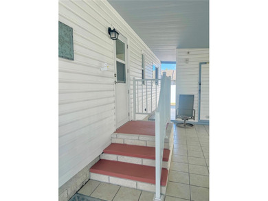 This home has the WOW factor.....Welcome to this beautifully on Fairway Village Golf Course in Florida - for sale on GolfHomes.com, golf home, golf lot