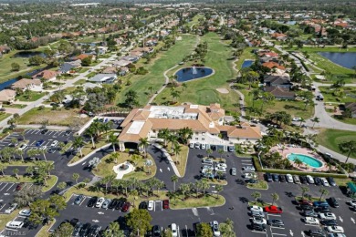 FANTASTIC WESTERN EXPOSURE LAKE AND GOLF COURSE VIEWS FROM THIS on Spanish Wells Golf and Country Club in Florida - for sale on GolfHomes.com, golf home, golf lot