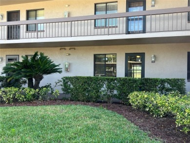 Welcome to this inviting first-floor, 2-bedroom, 2-bath condo in on East Lake Woodlands Country Club in Florida - for sale on GolfHomes.com, golf home, golf lot