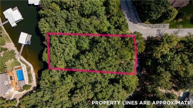 Situated on a generous .53-acre parcel in the prestigious Porto on The Club At Porto Cima in Missouri - for sale on GolfHomes.com, golf home, golf lot