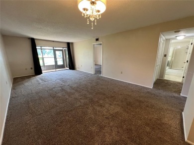 Welcome to this inviting first-floor, 2-bedroom, 2-bath condo in on East Lake Woodlands Country Club in Florida - for sale on GolfHomes.com, golf home, golf lot