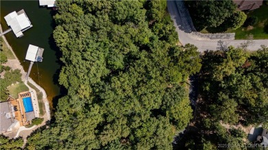 Situated on a generous .53-acre parcel in the prestigious Porto on The Club At Porto Cima in Missouri - for sale on GolfHomes.com, golf home, golf lot
