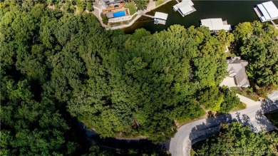 Situated on a generous .53-acre parcel in the prestigious Porto on The Club At Porto Cima in Missouri - for sale on GolfHomes.com, golf home, golf lot