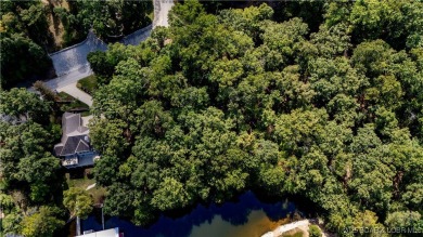 Situated on a generous .53-acre parcel in the prestigious Porto on The Club At Porto Cima in Missouri - for sale on GolfHomes.com, golf home, golf lot