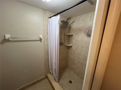Welcome to this inviting first-floor, 2-bedroom, 2-bath condo in on East Lake Woodlands Country Club in Florida - for sale on GolfHomes.com, golf home, golf lot
