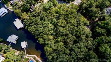 Situated on a generous .53-acre parcel in the prestigious Porto on The Club At Porto Cima in Missouri - for sale on GolfHomes.com, golf home, golf lot