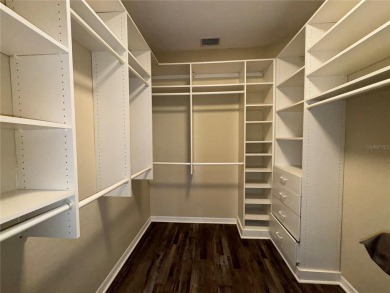 One or more photo(s) has been virtually staged. One or more on University Park Country Club in Florida - for sale on GolfHomes.com, golf home, golf lot