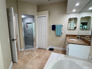 One or more photo(s) has been virtually staged. One or more on University Park Country Club in Florida - for sale on GolfHomes.com, golf home, golf lot
