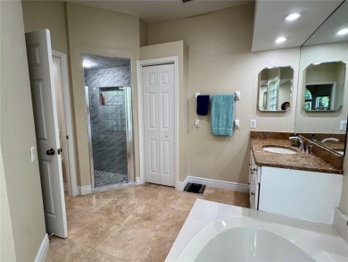 One or more photo(s) has been virtually staged. One or more on University Park Country Club in Florida - for sale on GolfHomes.com, golf home, golf lot