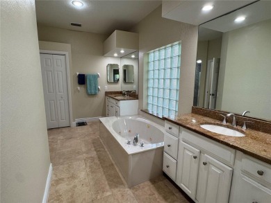 One or more photo(s) has been virtually staged. One or more on University Park Country Club in Florida - for sale on GolfHomes.com, golf home, golf lot