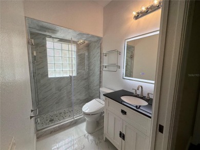 One or more photo(s) has been virtually staged. One or more on University Park Country Club in Florida - for sale on GolfHomes.com, golf home, golf lot