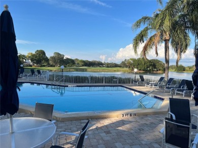 One or more photo(s) has been virtually staged. One or more on University Park Country Club in Florida - for sale on GolfHomes.com, golf home, golf lot