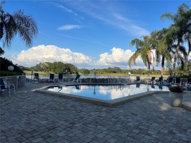 One or more photo(s) has been virtually staged. One or more on University Park Country Club in Florida - for sale on GolfHomes.com, golf home, golf lot