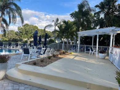 One or more photo(s) has been virtually staged. One or more on University Park Country Club in Florida - for sale on GolfHomes.com, golf home, golf lot
