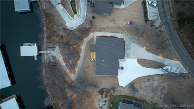 Beautiful newer construction 4 bed, 3 bath home located in a on Bayview Golf Course in Missouri - for sale on GolfHomes.com, golf home, golf lot