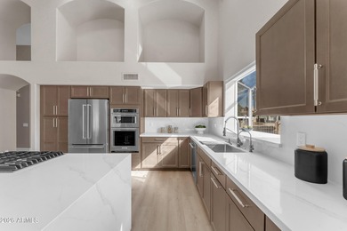 This home offers Luxury living with Modern Elegance and on Oakwood Golf Club  in Arizona - for sale on GolfHomes.com, golf home, golf lot