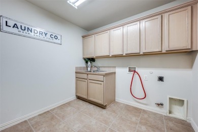 Step into luxury and comfort with this beautifully renovated on Wildhorse Golf Club of Robson Ranch in Texas - for sale on GolfHomes.com, golf home, golf lot