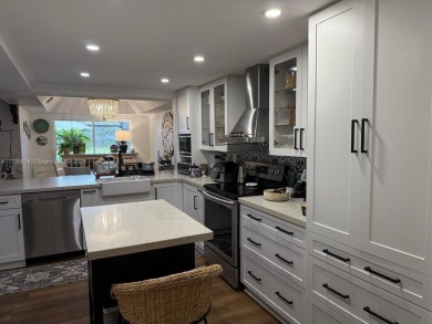 Stunning Remodeled Townhouse in the Heart of Doral! Located on Costa Greens Golf Club in Florida - for sale on GolfHomes.com, golf home, golf lot