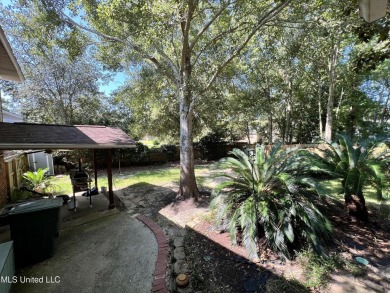 **Stunning Multilevel Home with Water Access & Golf Course on Sunkist Country Club, Inc. in Mississippi - for sale on GolfHomes.com, golf home, golf lot