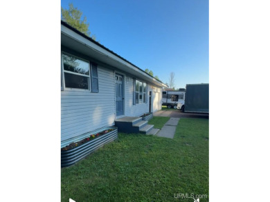 Beautiful three-bedroom,(with a 4th non conventional)two-bath on Ontonagon Golf Course in Michigan - for sale on GolfHomes.com, golf home, golf lot