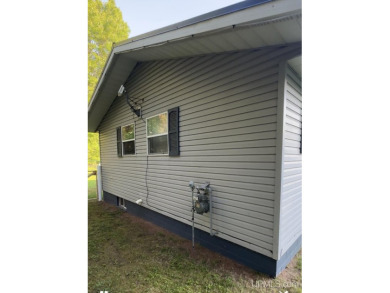 Beautiful three-bedroom,(with a 4th non conventional)two-bath on Ontonagon Golf Course in Michigan - for sale on GolfHomes.com, golf home, golf lot