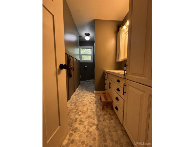 Beautiful three-bedroom,(with a 4th non conventional)two-bath on Ontonagon Golf Course in Michigan - for sale on GolfHomes.com, golf home, golf lot