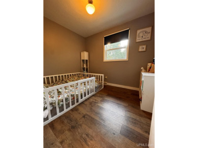 Beautiful three-bedroom,(with a 4th non conventional)two-bath on Ontonagon Golf Course in Michigan - for sale on GolfHomes.com, golf home, golf lot