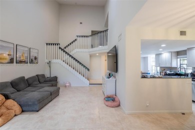 Beautifully upgraded end-unit townhome with stunning lake and on Boca Pointe Country Club in Florida - for sale on GolfHomes.com, golf home, golf lot