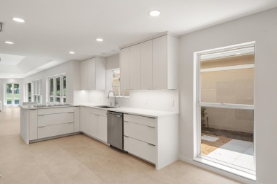 Experience unparalleled luxury in this fully renovated home on Monarch Country Club in Florida - for sale on GolfHomes.com, golf home, golf lot