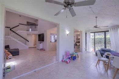 Beautifully upgraded end-unit townhome with stunning lake and on Boca Pointe Country Club in Florida - for sale on GolfHomes.com, golf home, golf lot