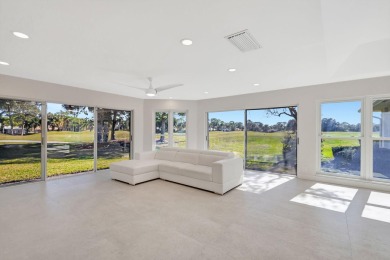 Experience unparalleled luxury in this fully renovated home on Monarch Country Club in Florida - for sale on GolfHomes.com, golf home, golf lot