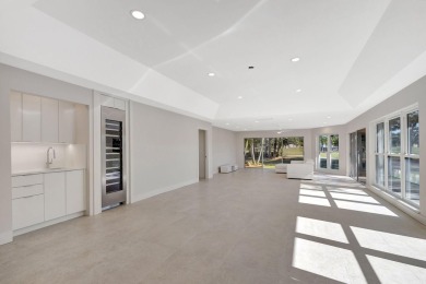 Experience unparalleled luxury in this fully renovated home on Monarch Country Club in Florida - for sale on GolfHomes.com, golf home, golf lot